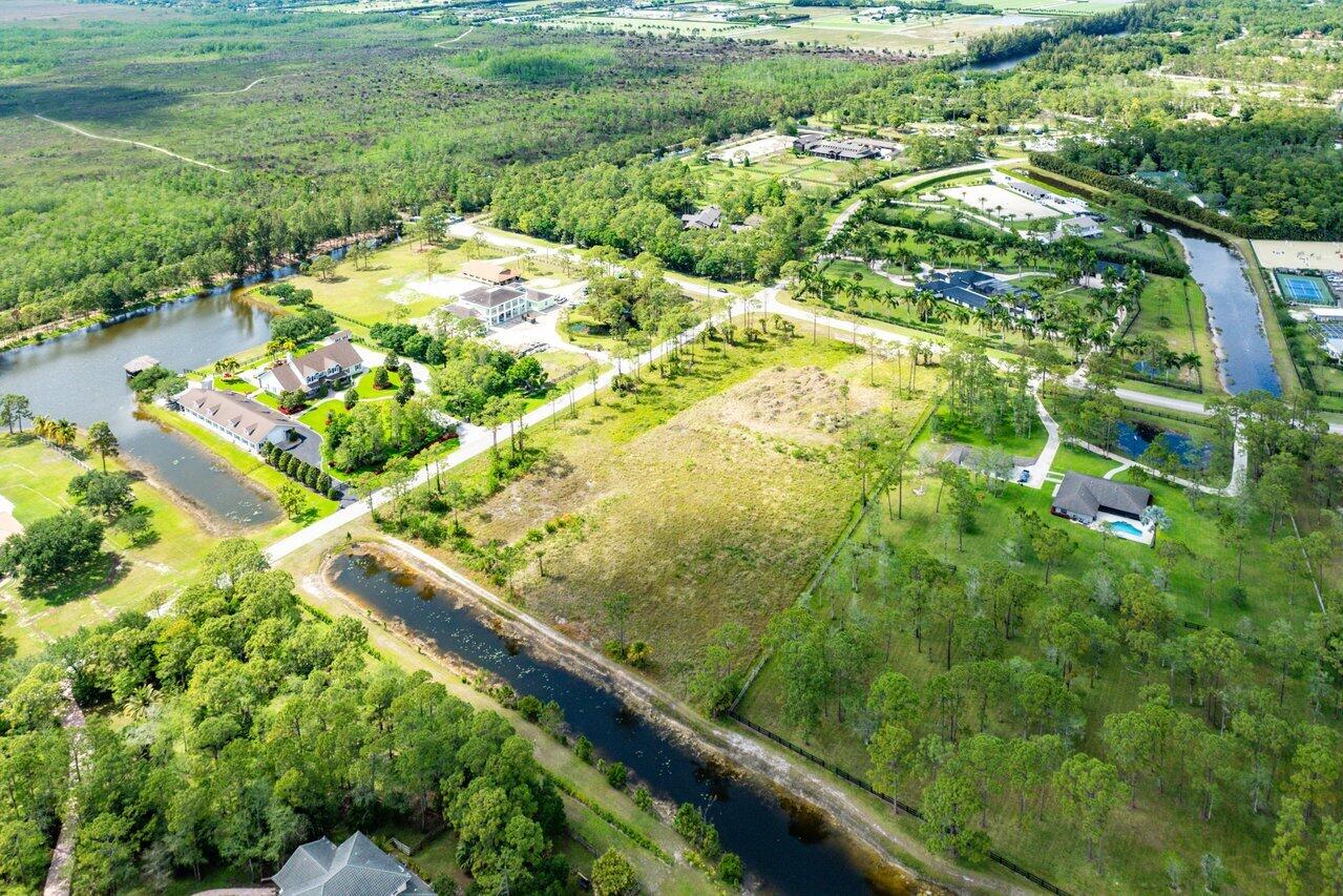 6248 Homeland Road Lake Worth, FL 33449 - Photo 14 of 22 a view of a garden with a tree