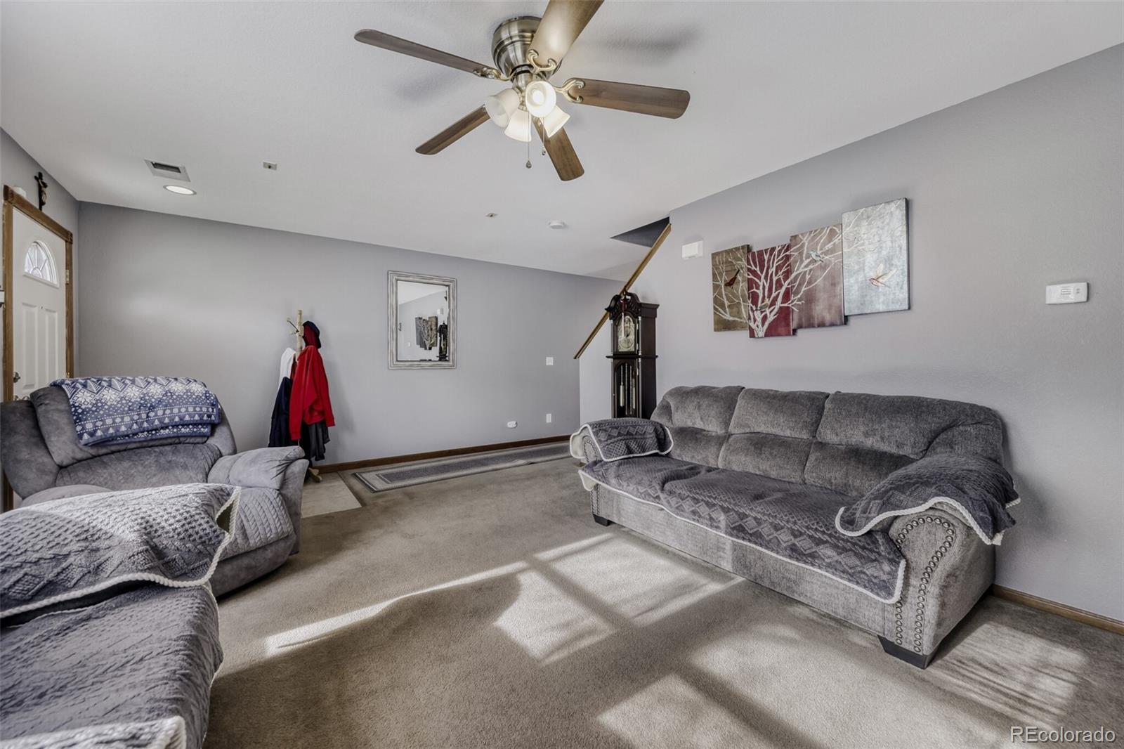 1435 Hummingbird Circle Brighton, CO 80601 - Photo 4 of 22 a living room with furniture
