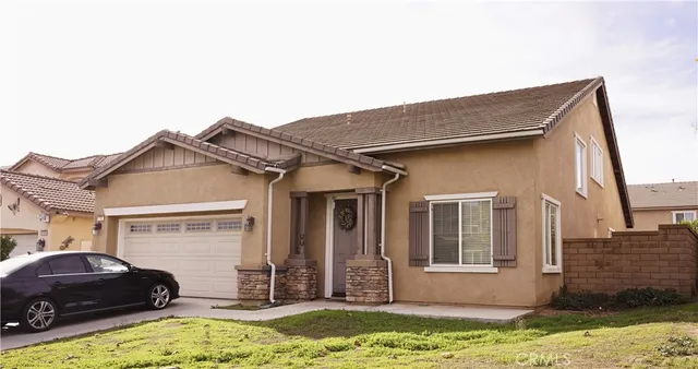 a house view with a garden space