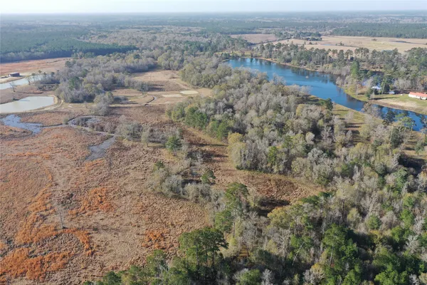 an aerial view of house with beach