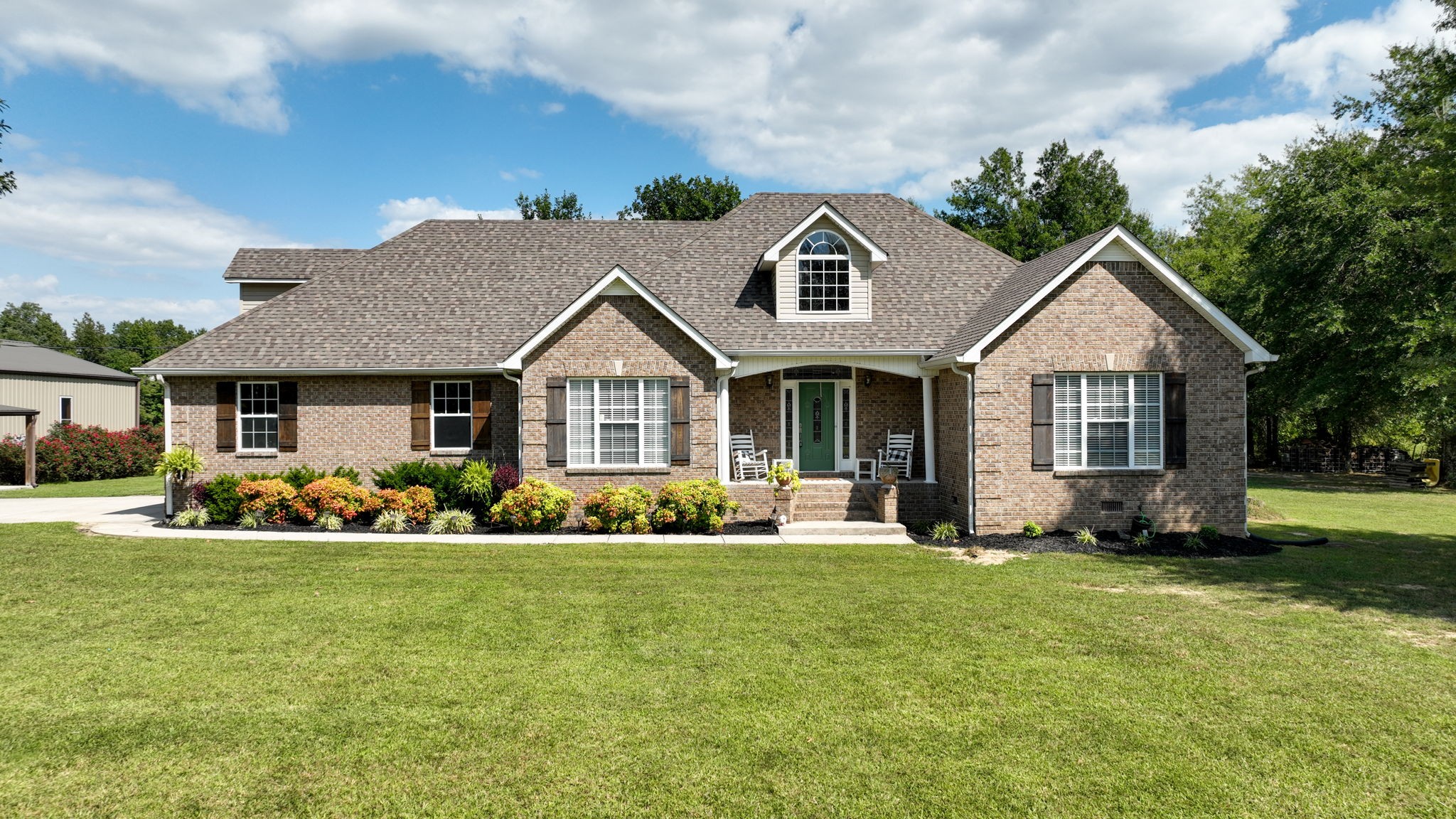 1972 Espy Road Bradyville, TN 37026 - Photo 1 of 67 a front view of a house with a yard