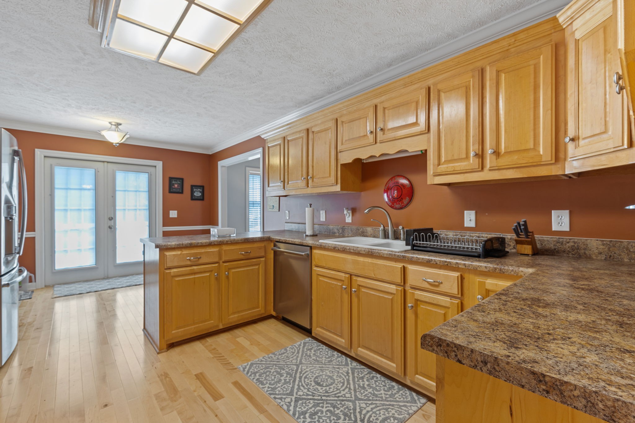 1972 Espy Road Bradyville, TN 37026 - Photo 17 of 67 a kitchen with stainless steel appliances granite countertop a sink and cabinets
