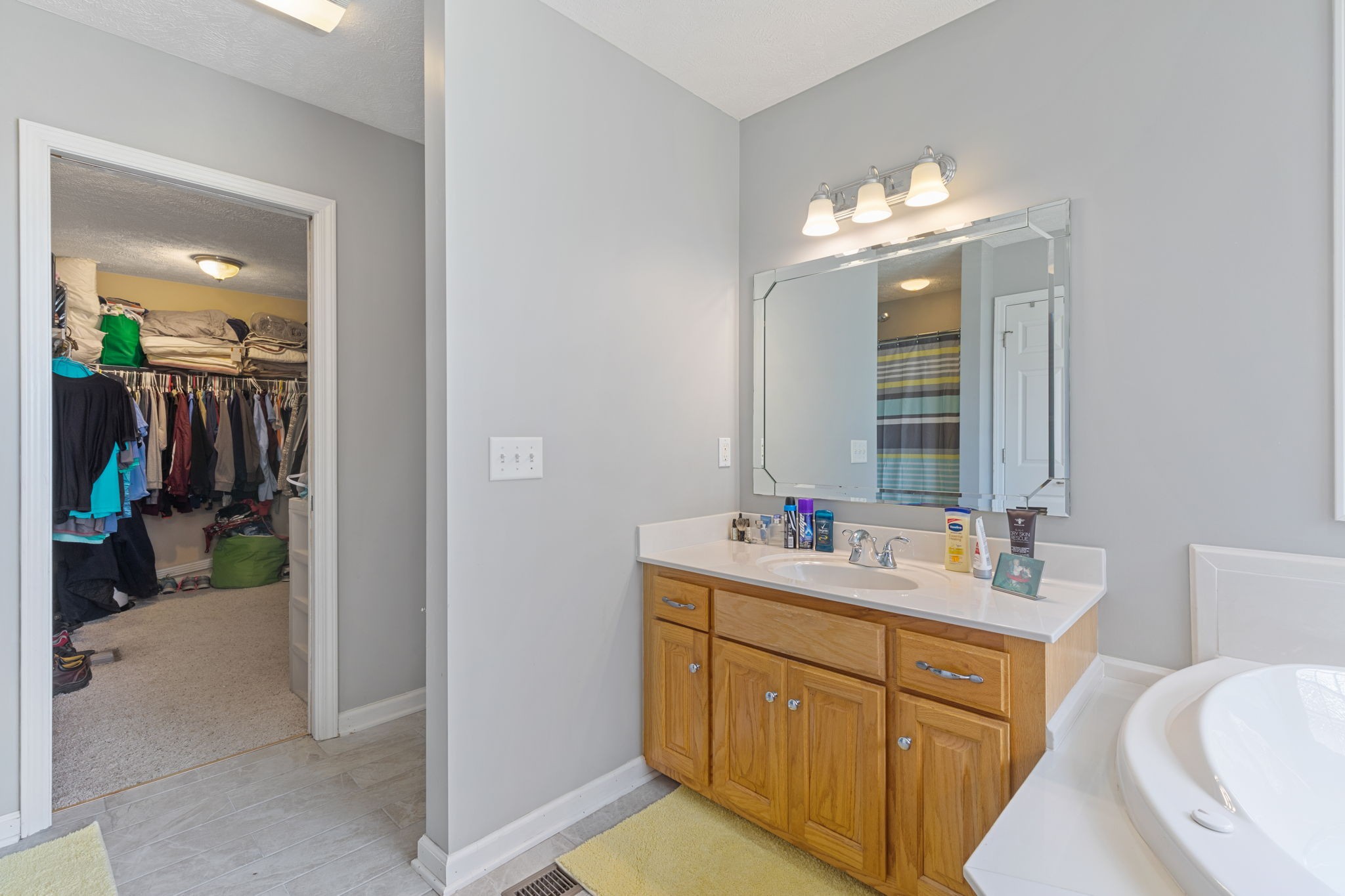 1972 Espy Road Bradyville, TN 37026 - Photo 27 of 67 a bathroom with a sink vanity and a mirror