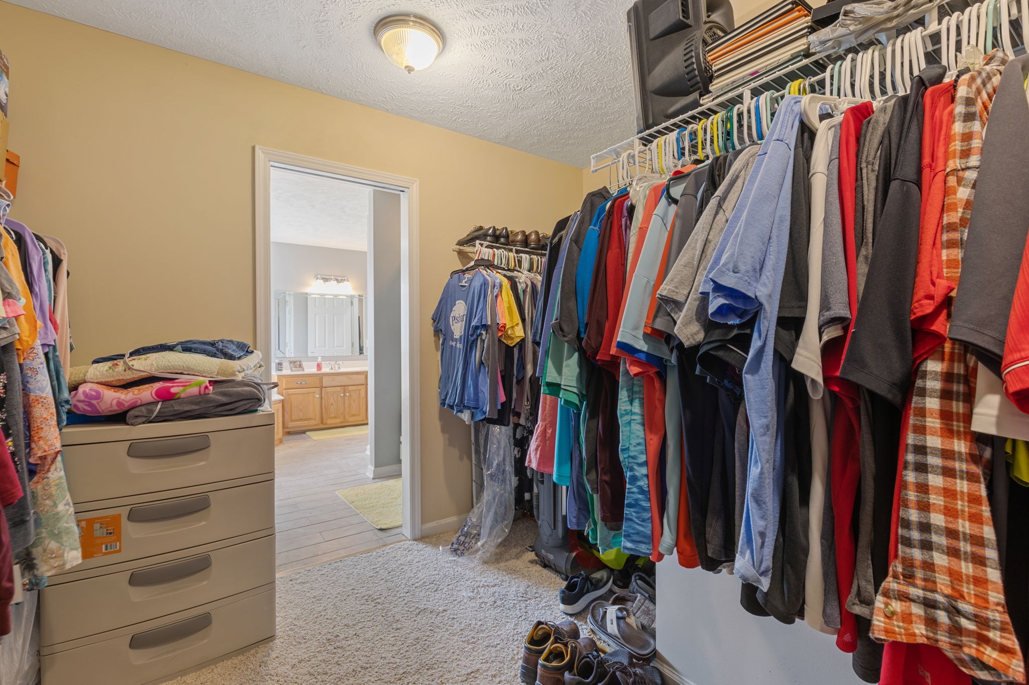 1972 Espy Road Bradyville, TN 37026 - Photo 30 of 67 a view of walk in closet with clothes