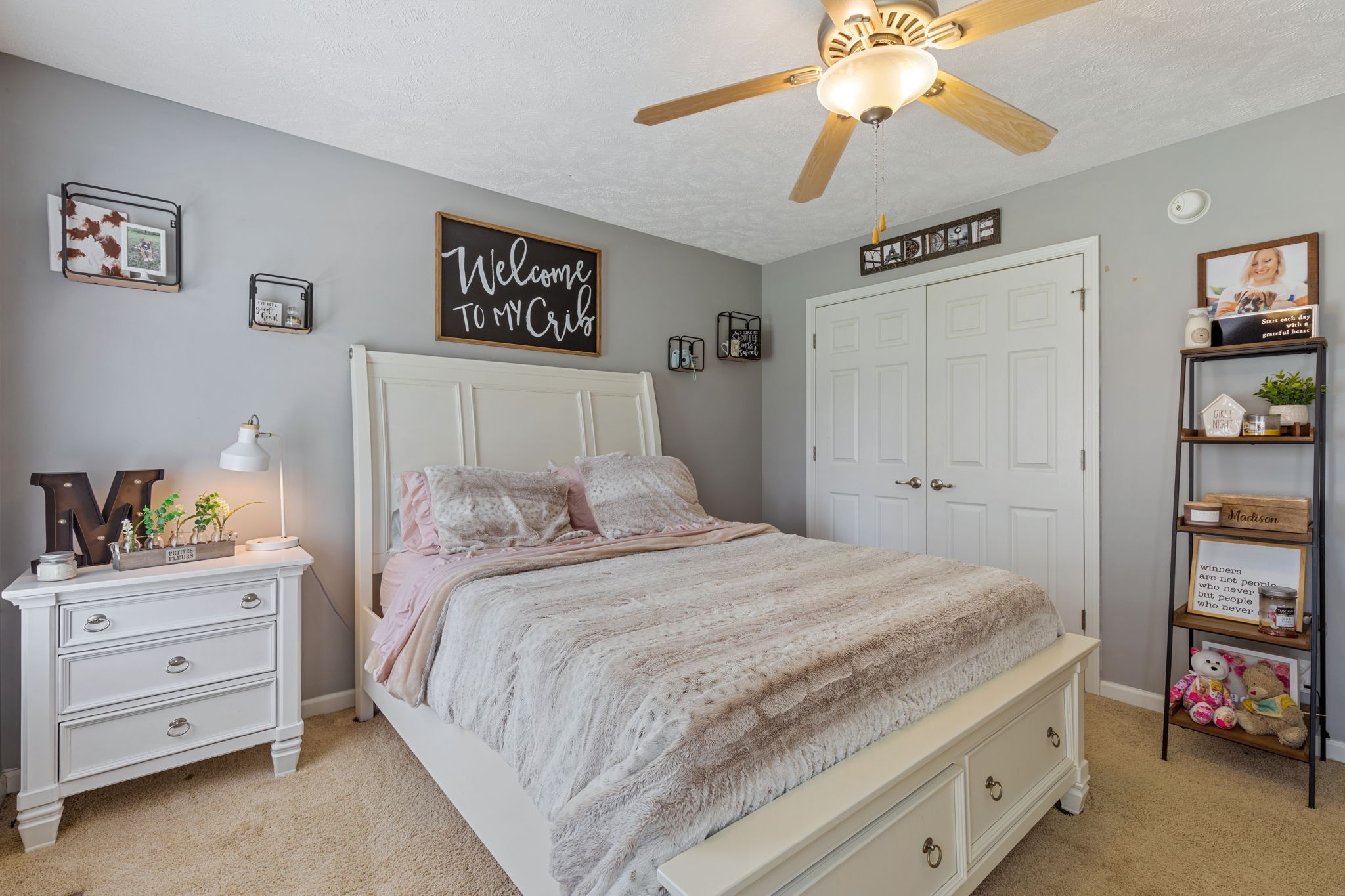 1972 Espy Road Bradyville, TN 37026 - Photo 38 of 67 a bedroom with a bed and a chandelier