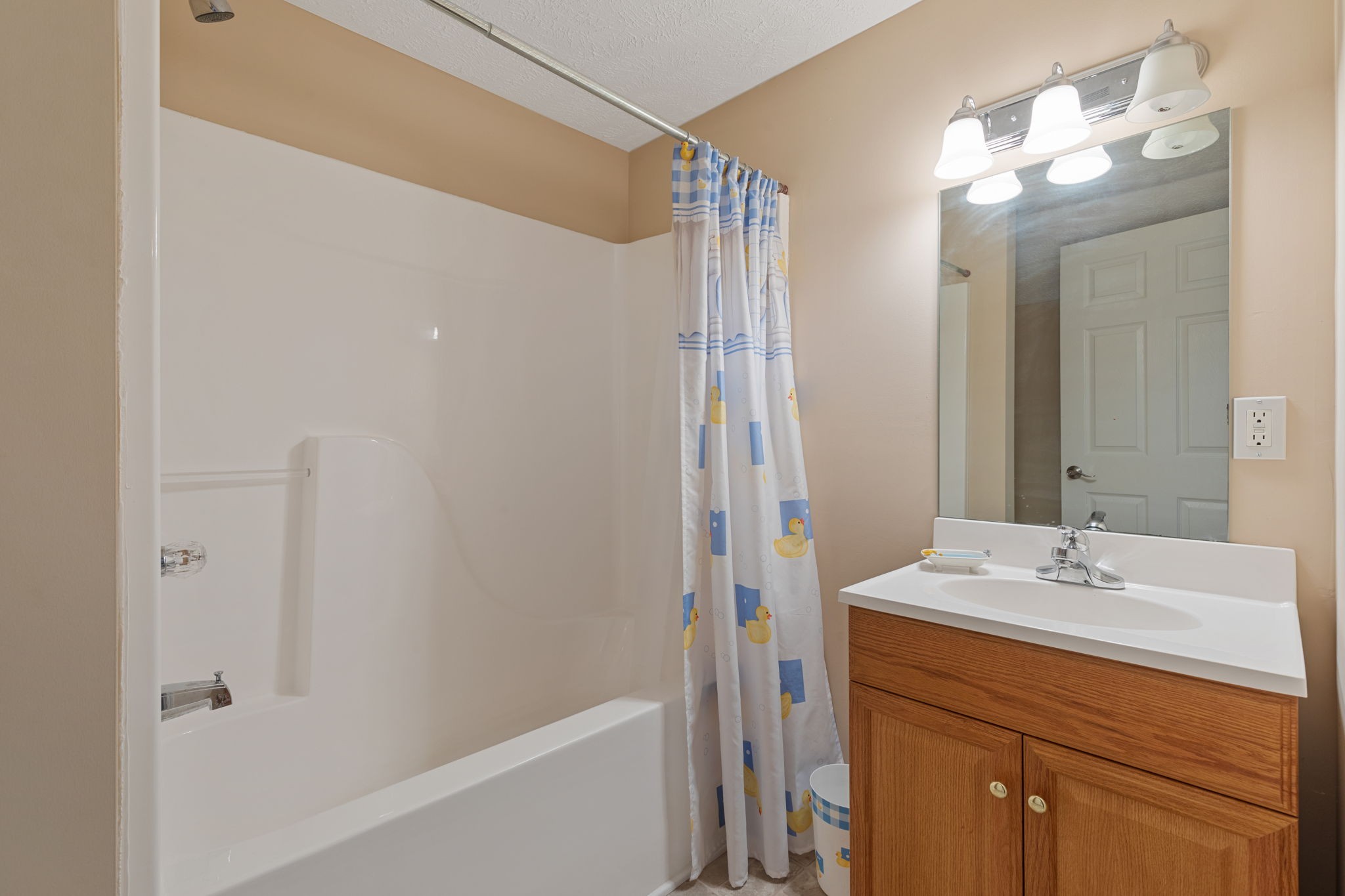 1972 Espy Road Bradyville, TN 37026 - Photo 45 of 67 a bathroom with a sink a mirror and a shower