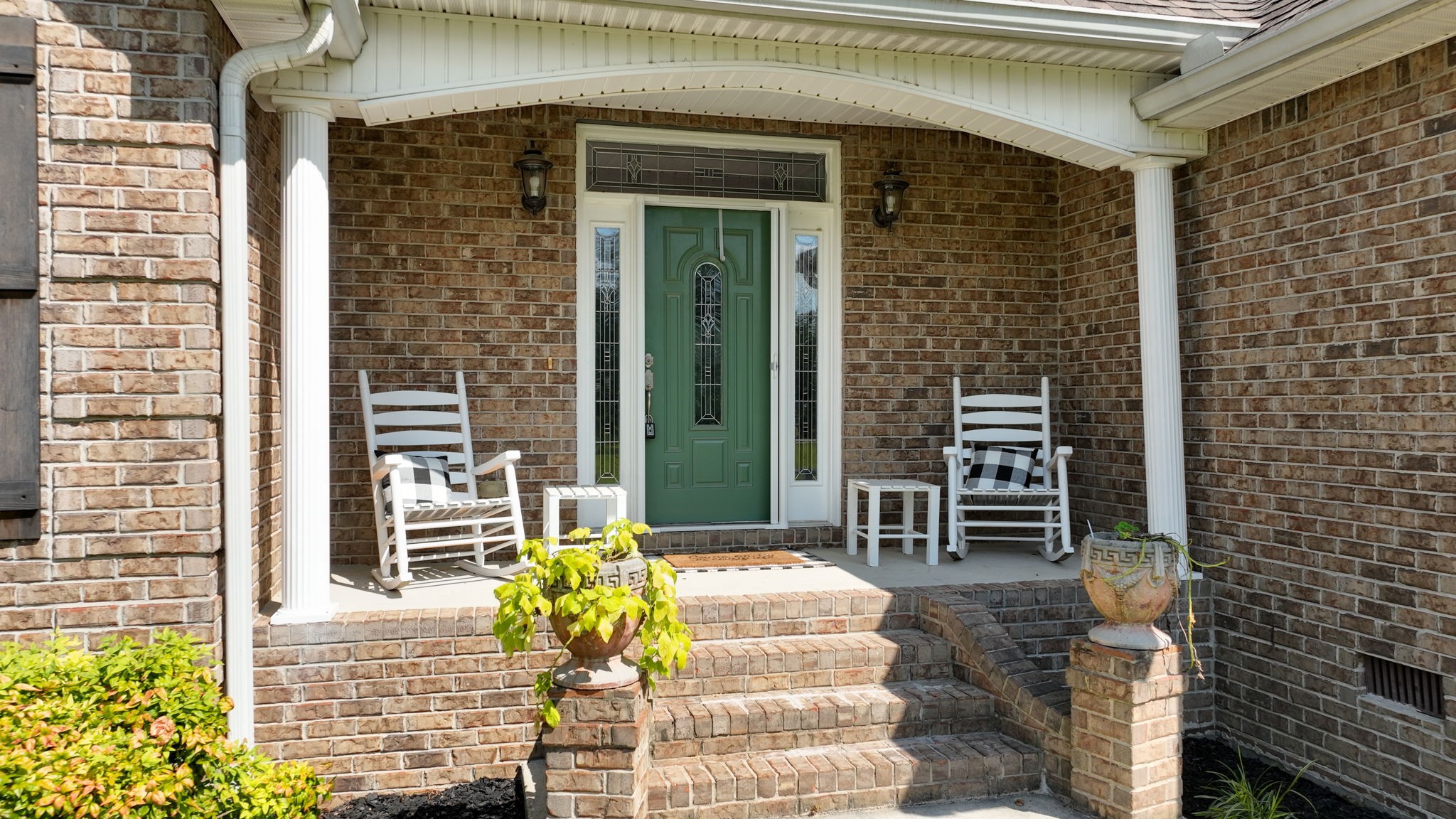 1972 Espy Road Bradyville, TN 37026 - Photo 5 of 67 a front view of a house with outdoor seating