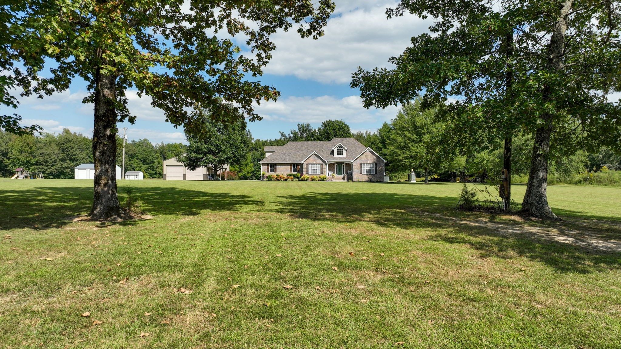 1972 Espy Road Bradyville, TN 37026 - Photo 60 of 67 a view of a house with a yard