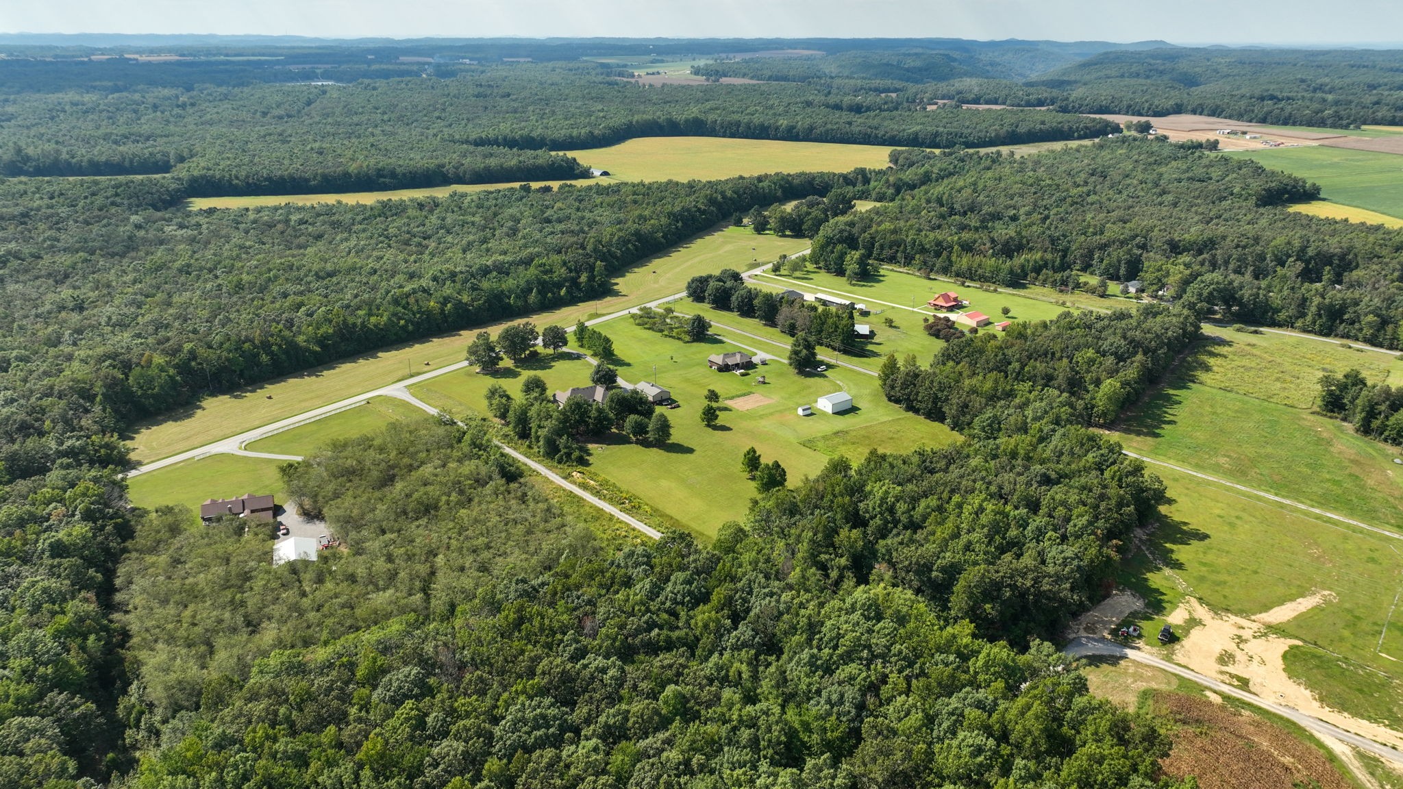 1972 Espy Road Bradyville, TN 37026 - Photo 63 of 67 an aerial view of a house with a yard