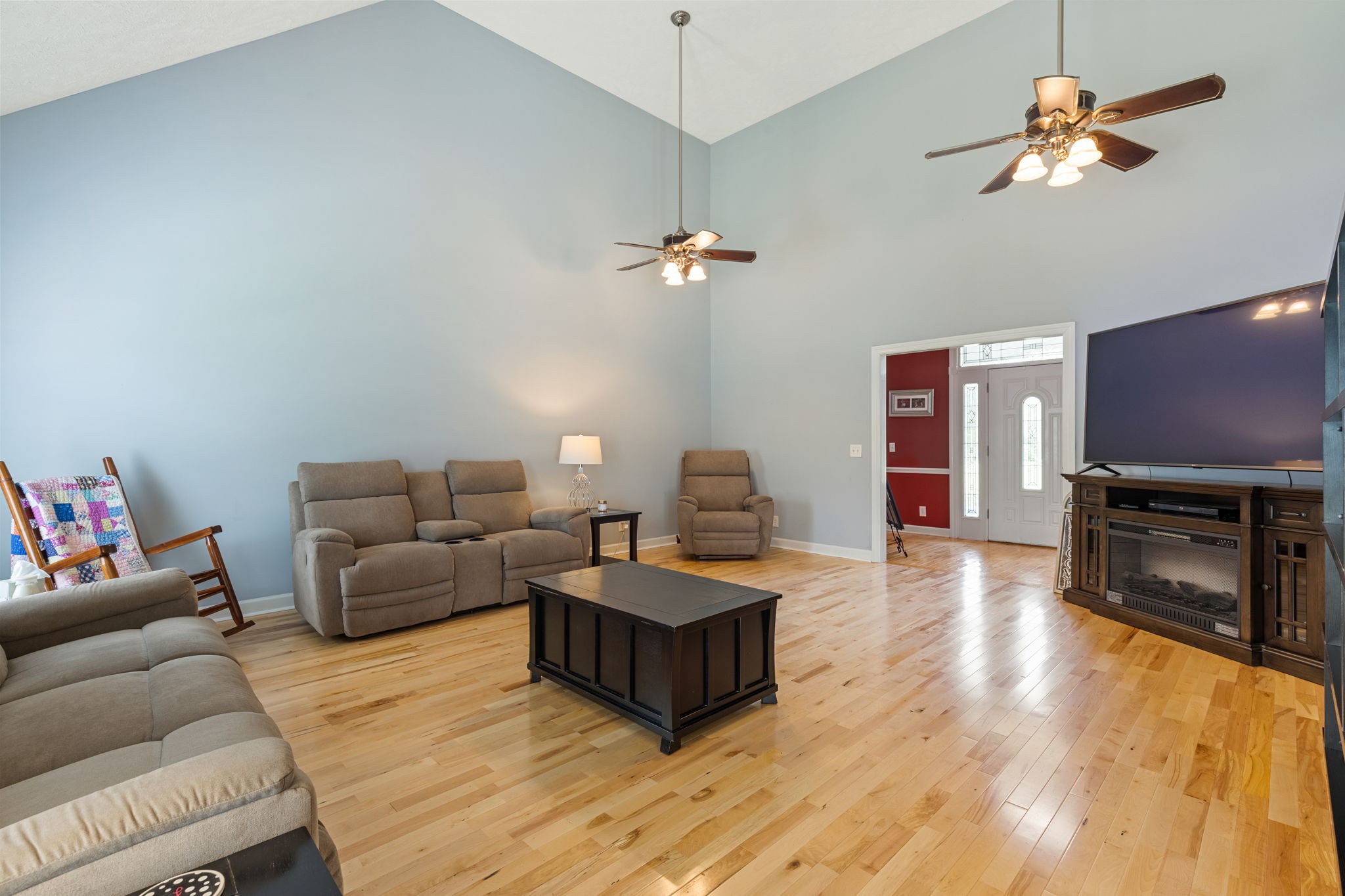 1972 Espy Road Bradyville, TN 37026 - Photo 9 of 67 a living room with furniture a fireplace and a flat screen tv