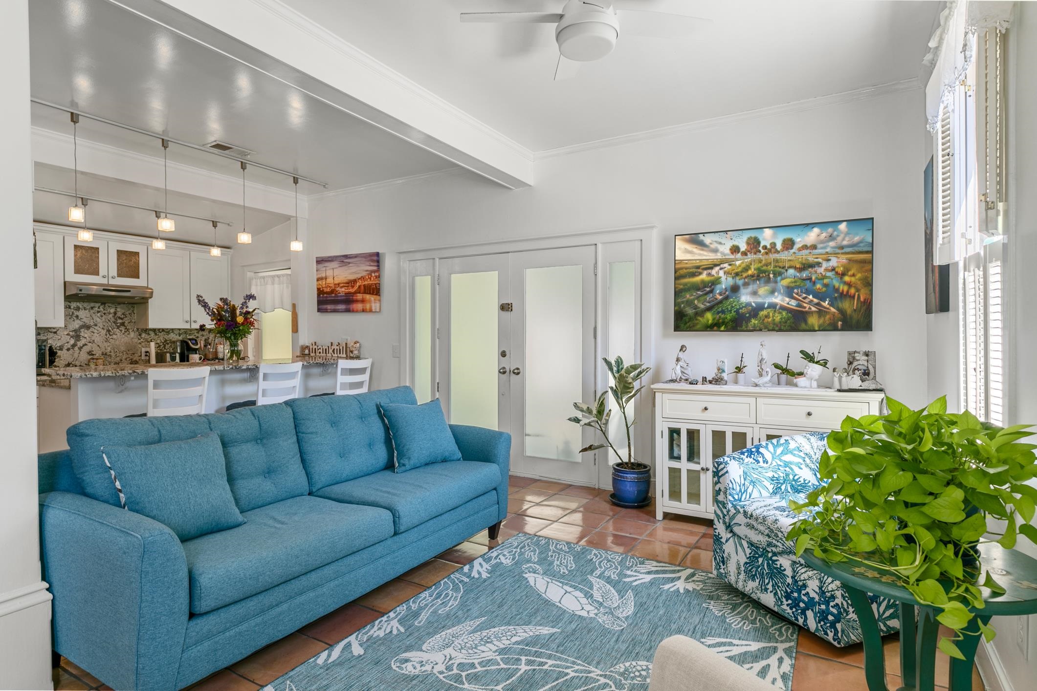 46 St Francis Street St. Augustine, FL 32084 - Photo 12 of 48 a living room with furniture and a flat screen tv