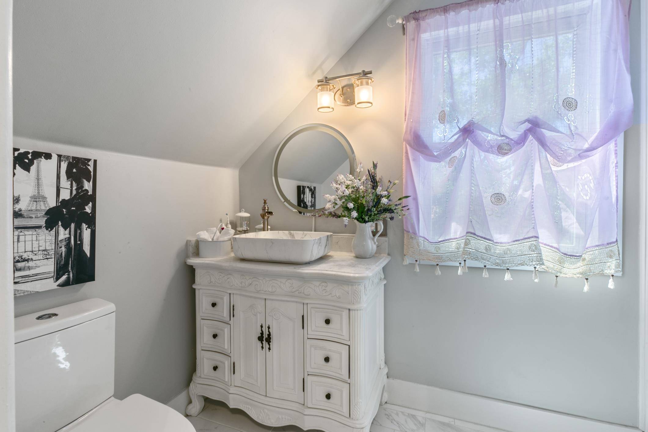 46 St Francis Street St. Augustine, FL 32084 - Photo 32 of 48 a bathroom with a sink vanity and mirror