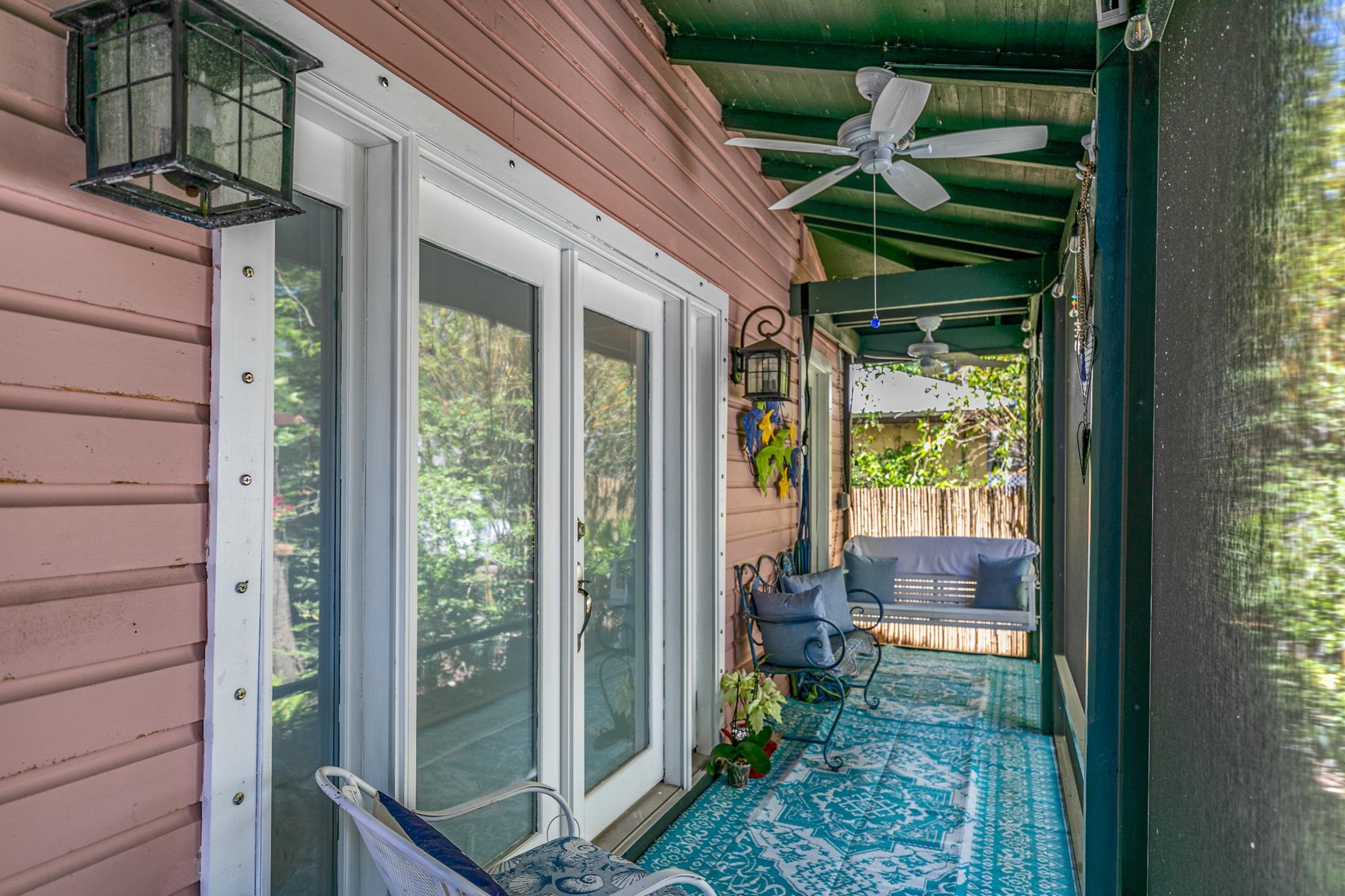 46 St Francis Street St. Augustine, FL 32084 - Photo 37 of 48 a backyard of a house with outdoor seating and plants