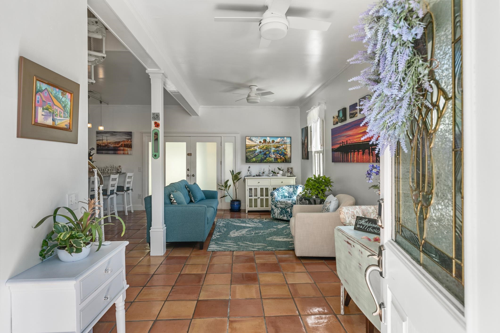 46 St Francis Street St. Augustine, FL 32084 - Photo 6 of 48 a living room with furniture and a potted plant