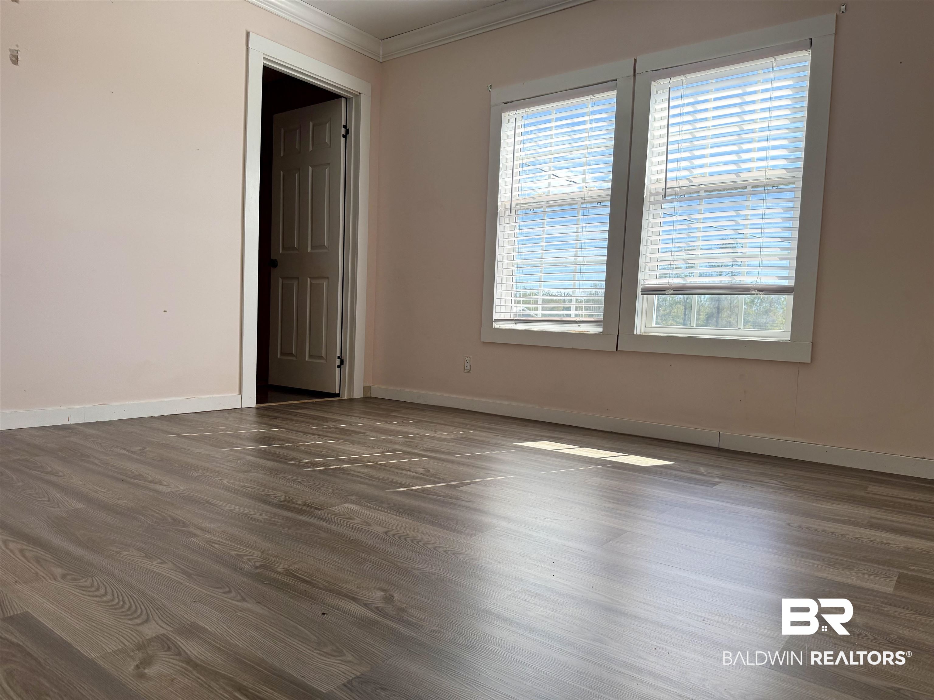 1064 Old Fannie Road Flomaton, AL 36441 - Photo 11 of 17 Unfurnished room with crown molding and wood finished floors