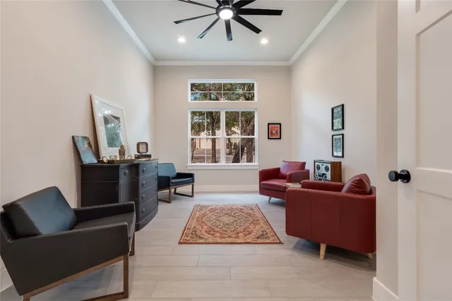 a living room with furniture and a window