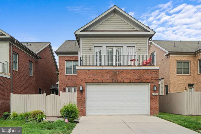 front view of a house with a patio