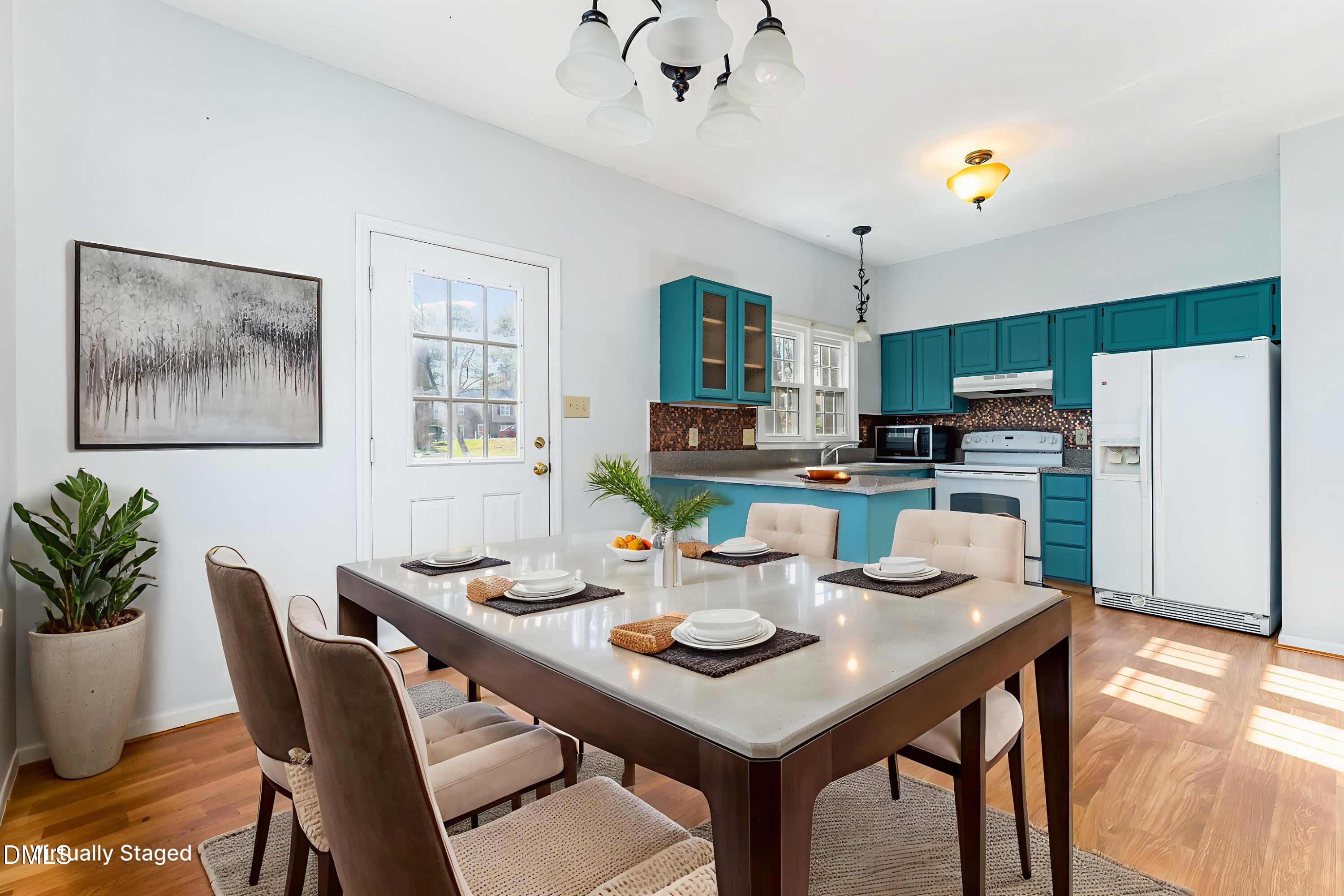 6205 Waterside Lane Raleigh, NC 27613 - Photo 16 of 40 Dining into Kitchen - virtually staged