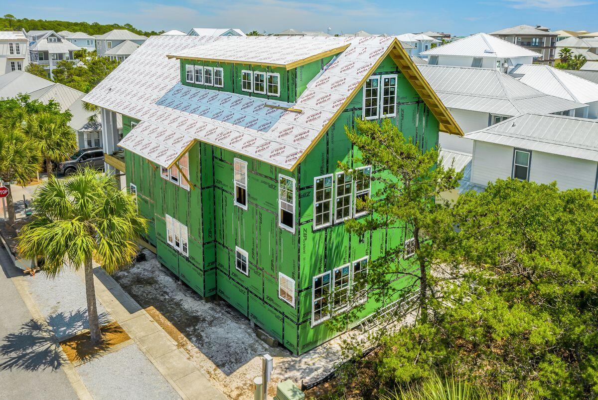 149 West Seacrest Beach Blvd Inlet Beach Inlet Beach, FL 32461 - Photo 11 of 15 a front view of a house with garden