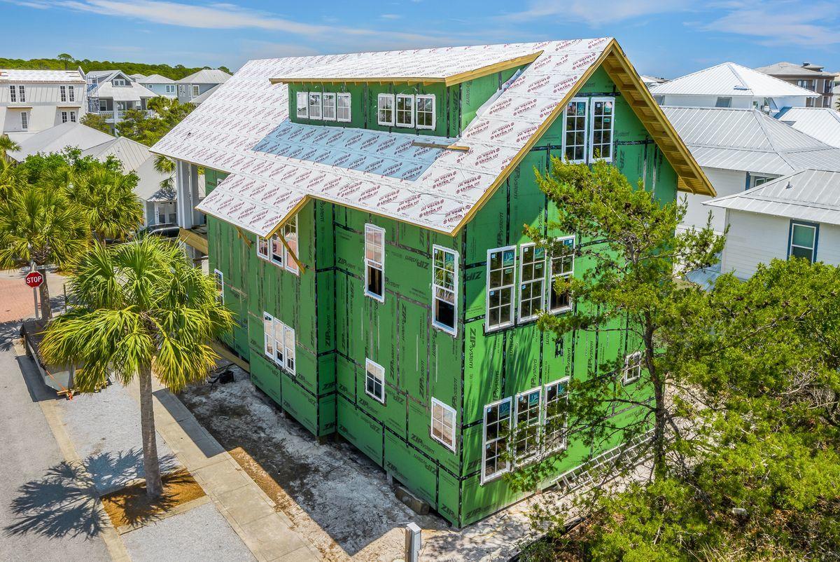 149 West Seacrest Beach Blvd Inlet Beach Inlet Beach, FL 32461 - Photo 13 of 15 an aerial view of a house with a garden