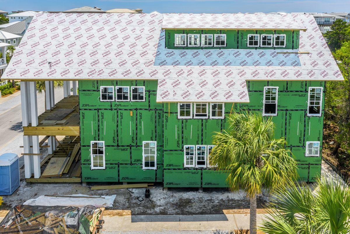 149 West Seacrest Beach Blvd Inlet Beach Inlet Beach, FL 32461 - Photo 14 of 15 a front view of a house with garden
