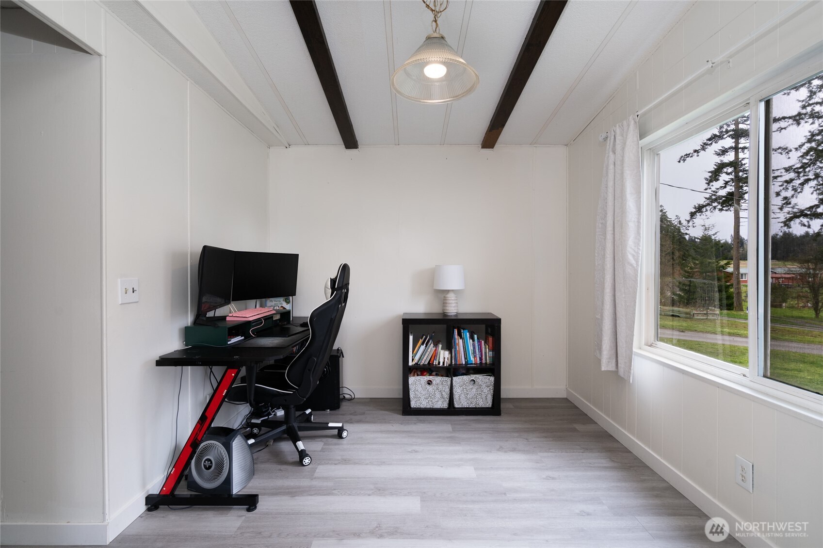 4540 Monkey Hill Road Oak Harbor, WA 98277 - Photo 12 of 36 a view of a workspace with furniture and a window