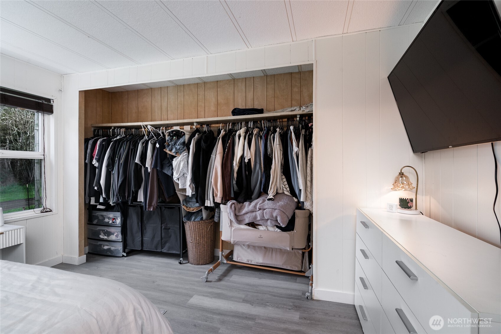 4540 Monkey Hill Road Oak Harbor, WA 98277 - Photo 17 of 36 a view of walk in closet with clothes and shoes
