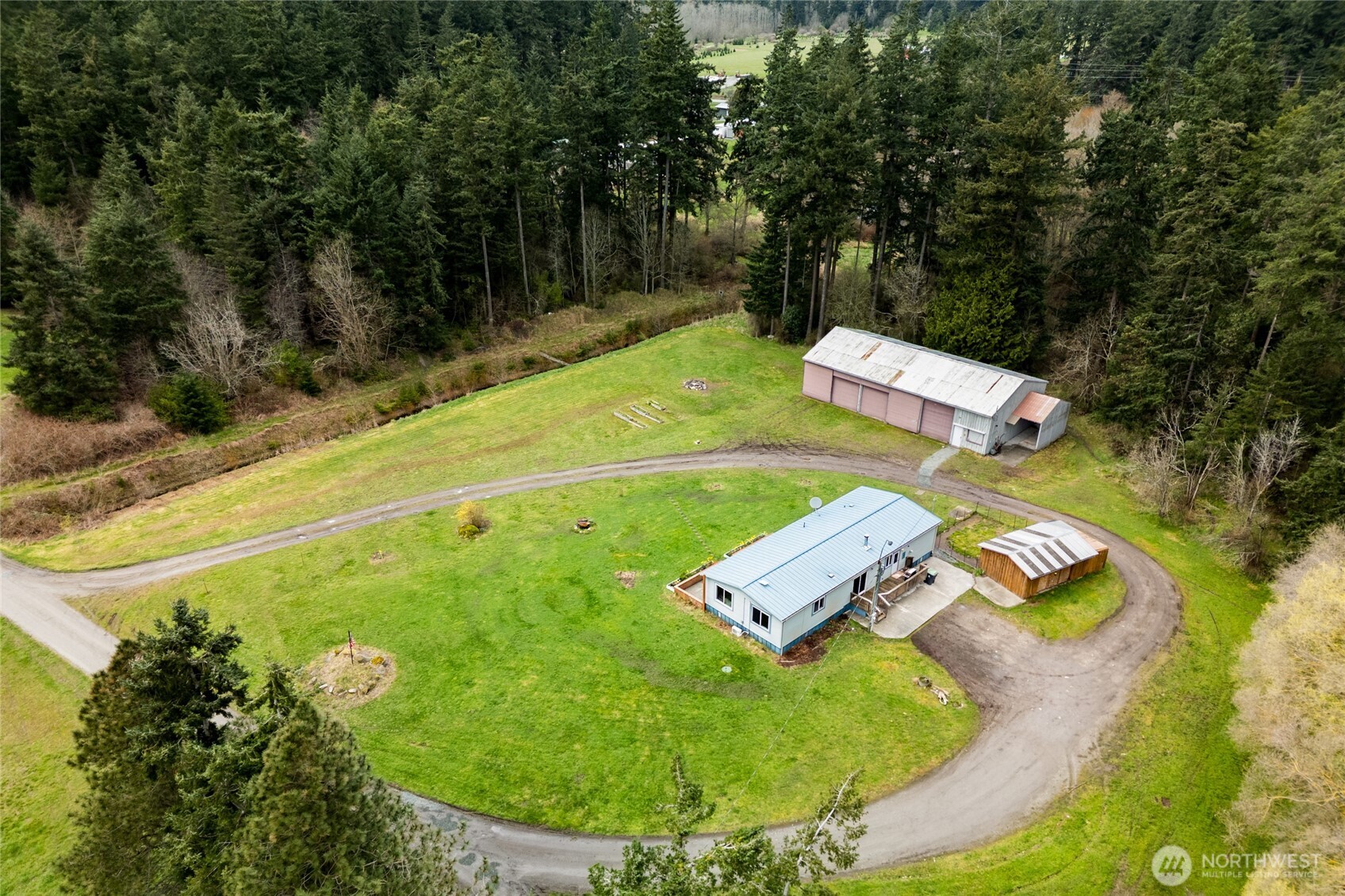 4540 Monkey Hill Road Oak Harbor, WA 98277 - Photo 26 of 36 an aerial view of a pool