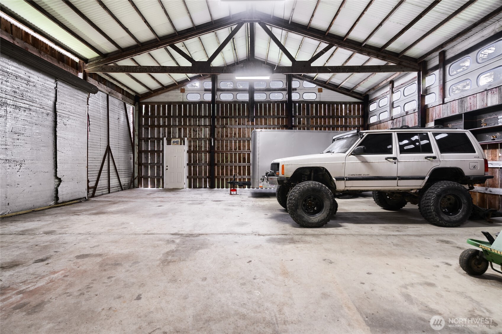 4540 Monkey Hill Road Oak Harbor, WA 98277 - Photo 30 of 36 a view of parking garage with cars
