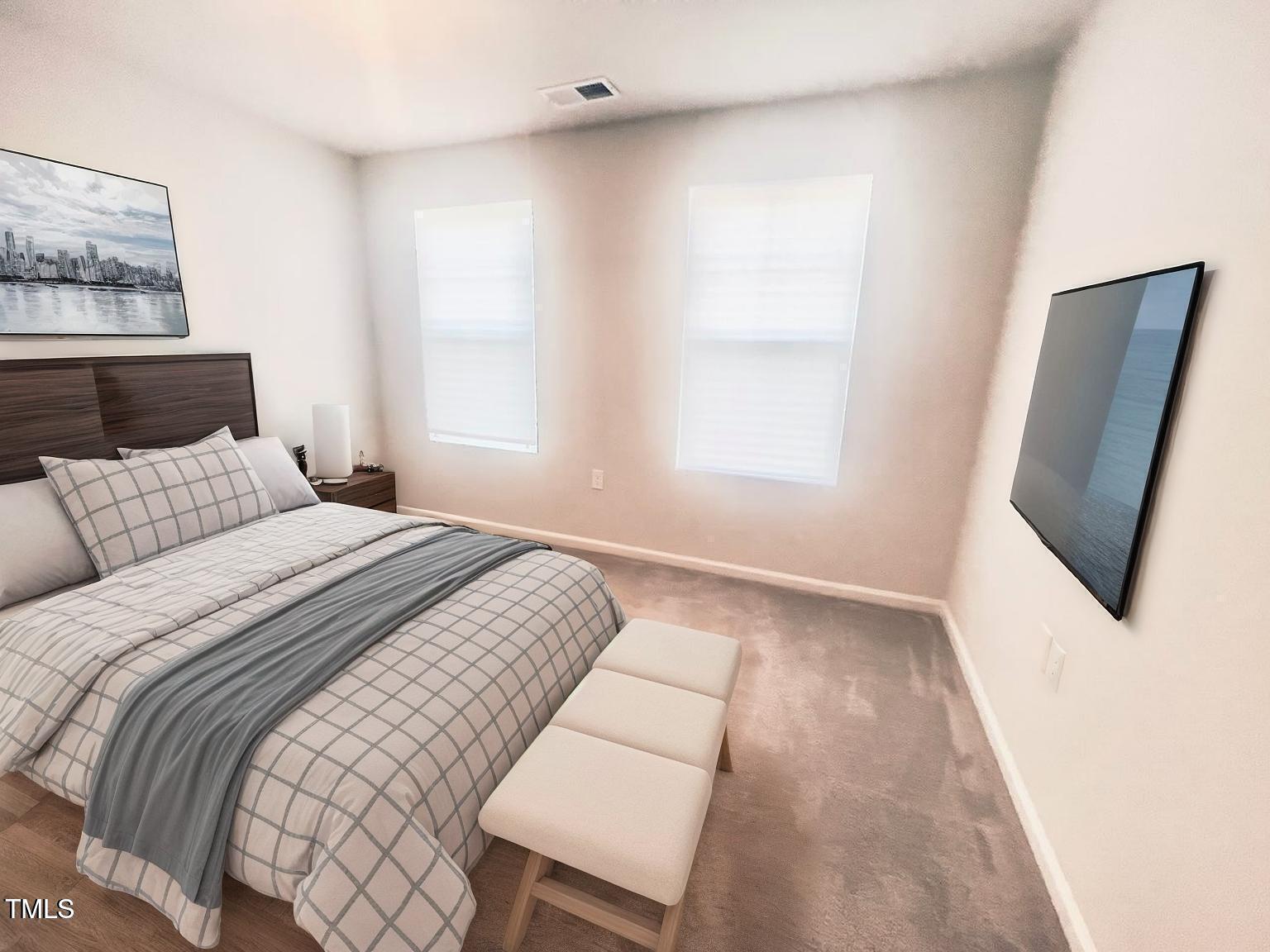 321 Devon Cliffs Drive Wake Forest, NC 27587 - Photo 16 of 26 a bedroom with a bed and a large window