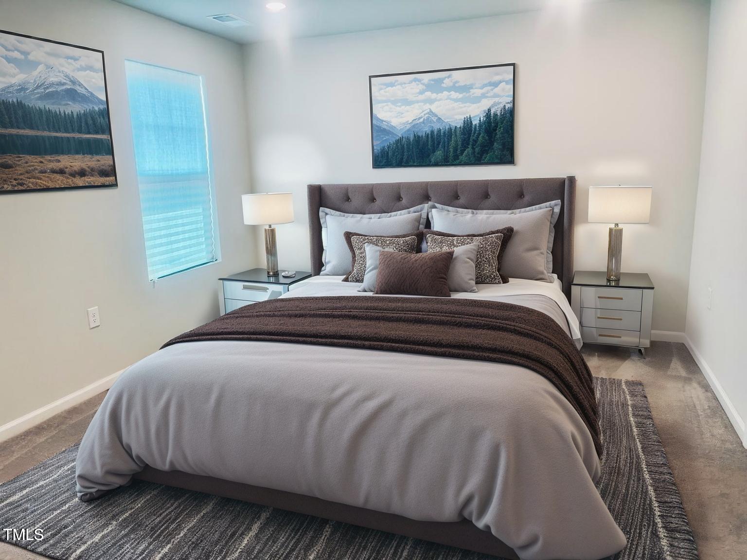 321 Devon Cliffs Drive Wake Forest, NC 27587 - Photo 17 of 26 a bedroom with a bed and painting on the wall