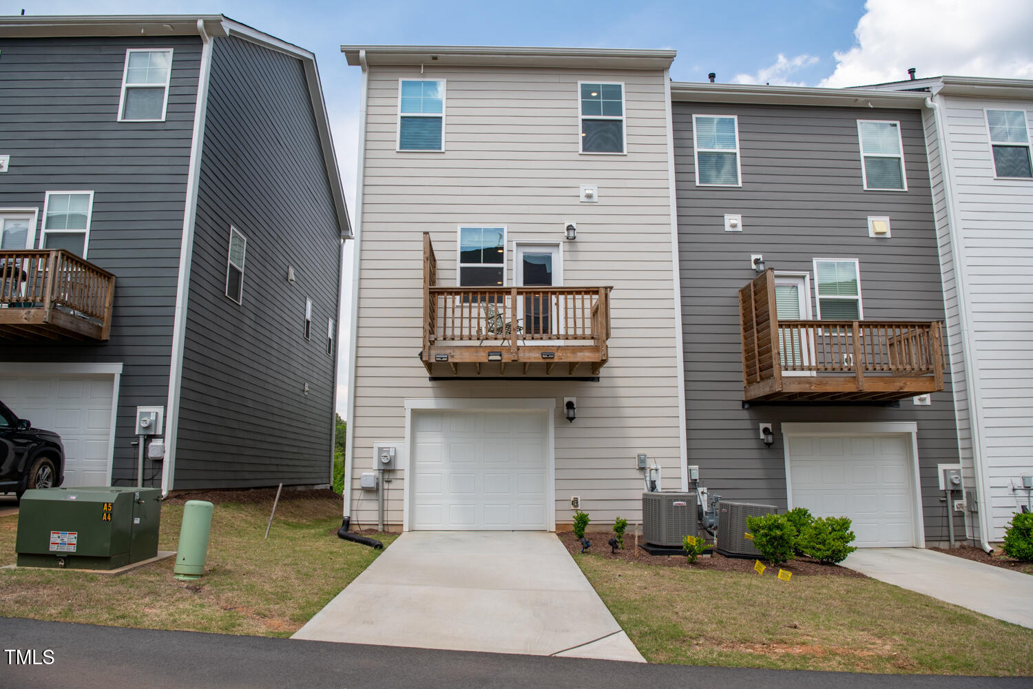 321 Devon Cliffs Drive Wake Forest, NC 27587 - Photo 22 of 26 a front view of a house with garage