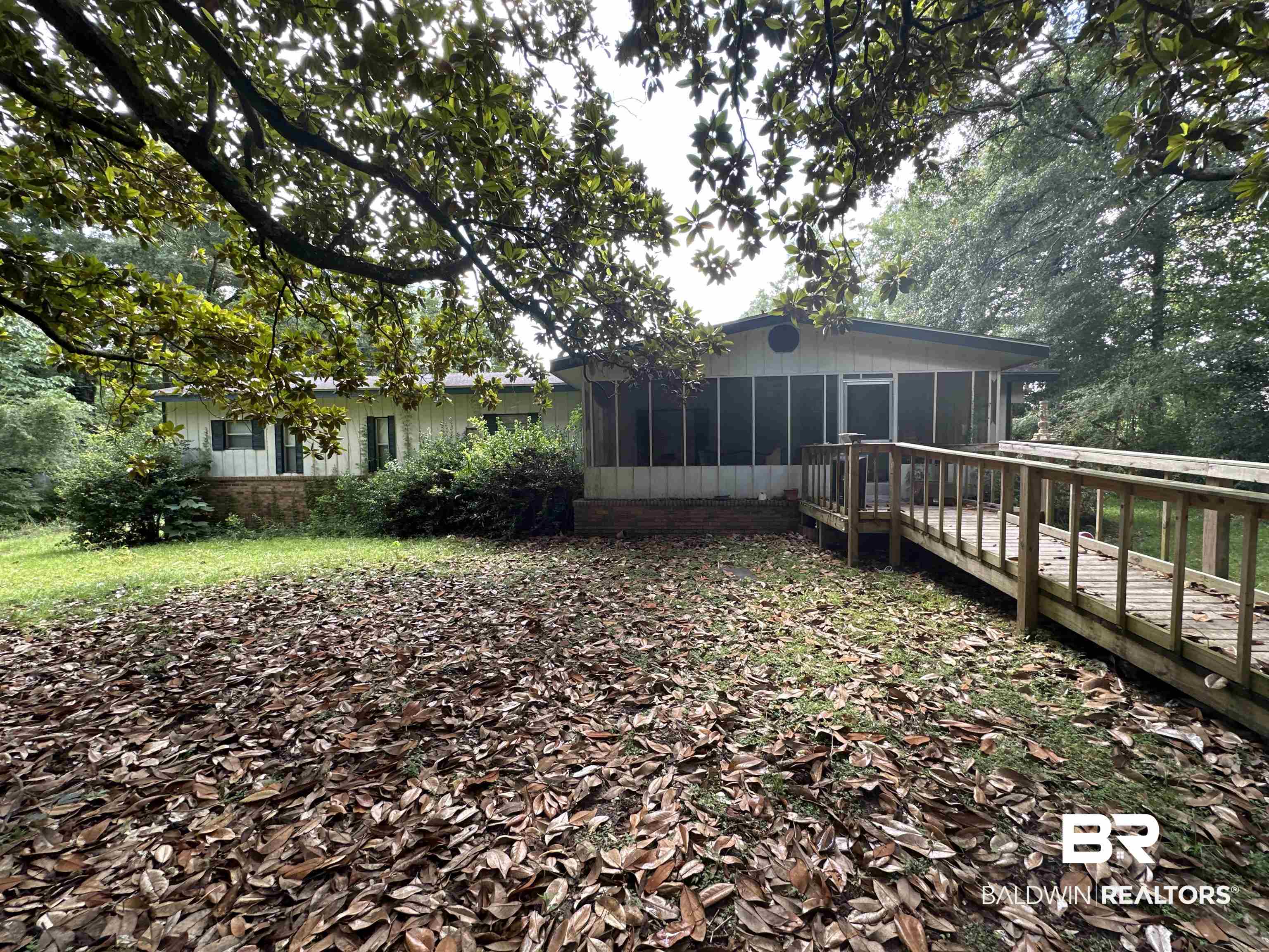 1850 Repoll Drive Mobile, AL 36695 - Photo 16 of 26 View of yard featuring a sunroom