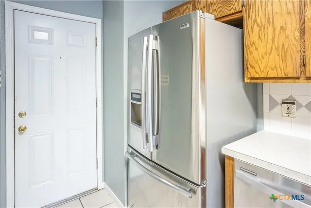 a bathroom with a shower and a sink