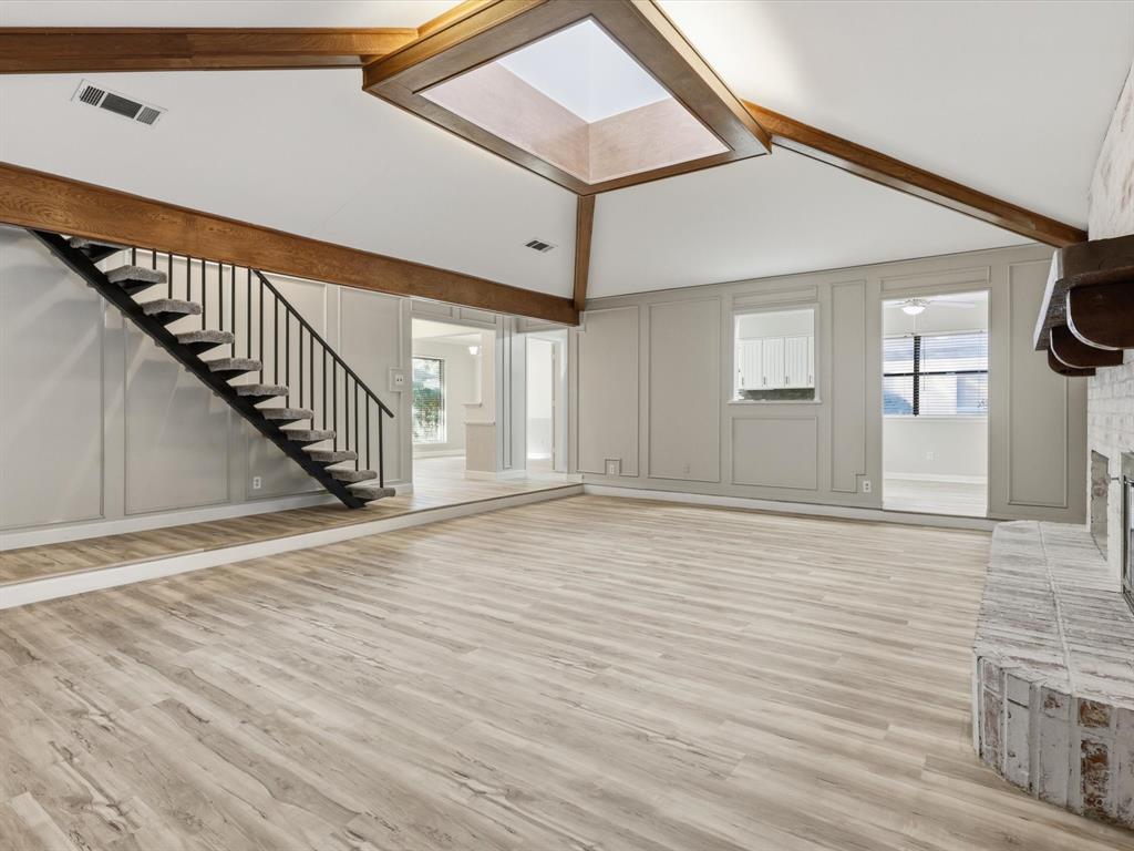 1811 Briarcrest Lane Arlington, TX 76012 - Photo 13 of 29 a view of an entryway with wooden floor