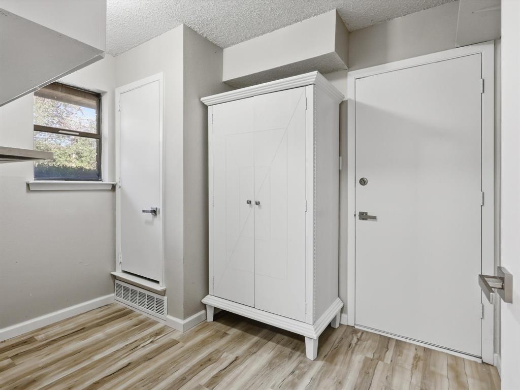 1811 Briarcrest Lane Arlington, TX 76012 - Photo 17 of 29 a view of empty room with wooden floor