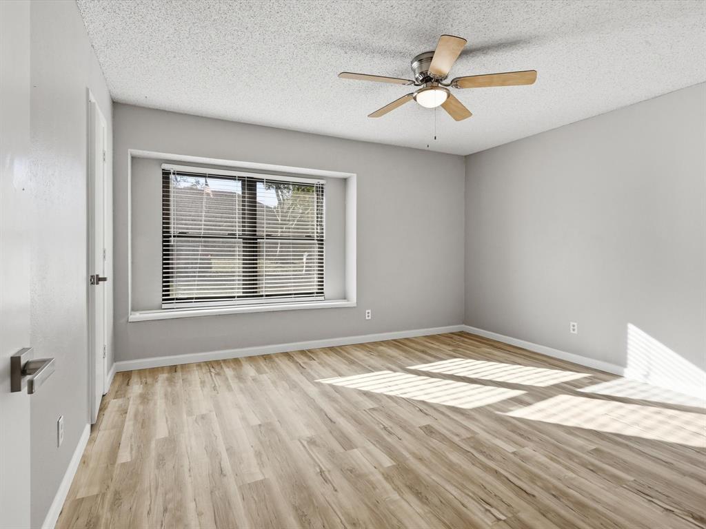 1811 Briarcrest Lane Arlington, TX 76012 - Photo 22 of 29 a view of an empty room and window