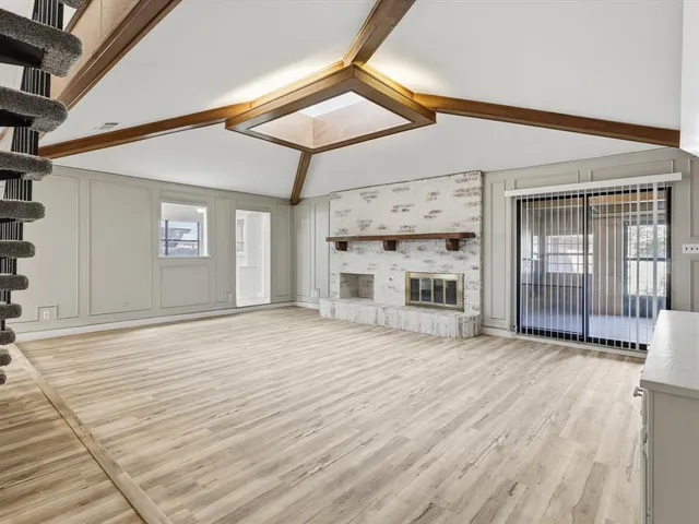 a kitchen with a sink cabinets and stainless steel appliances