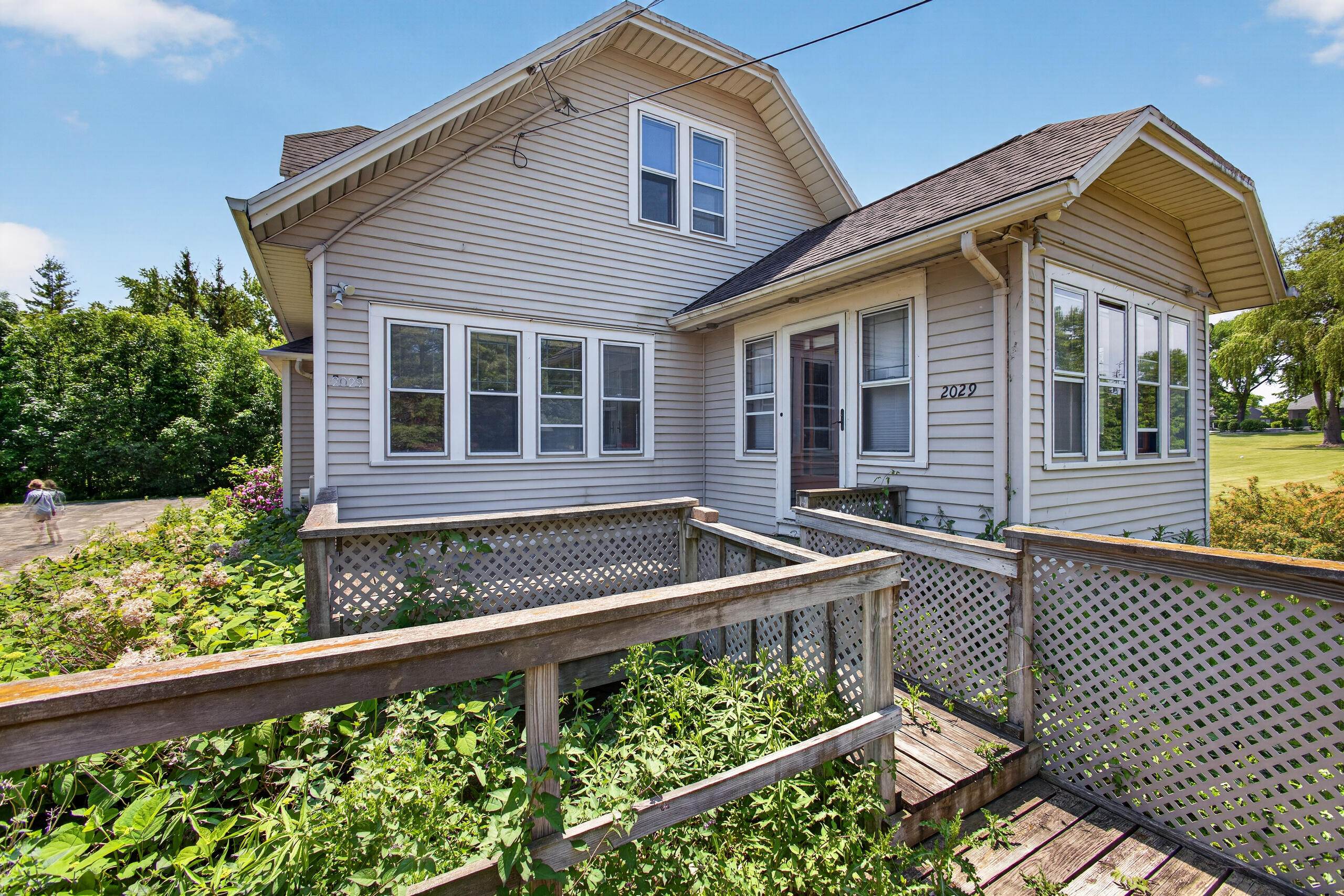 2029 West Donges Bay Road, Unit 2031 Mequon, WI 53092 - Photo 60 of 68 Front of Duplex