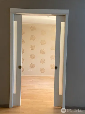 a view of an empty room with a window