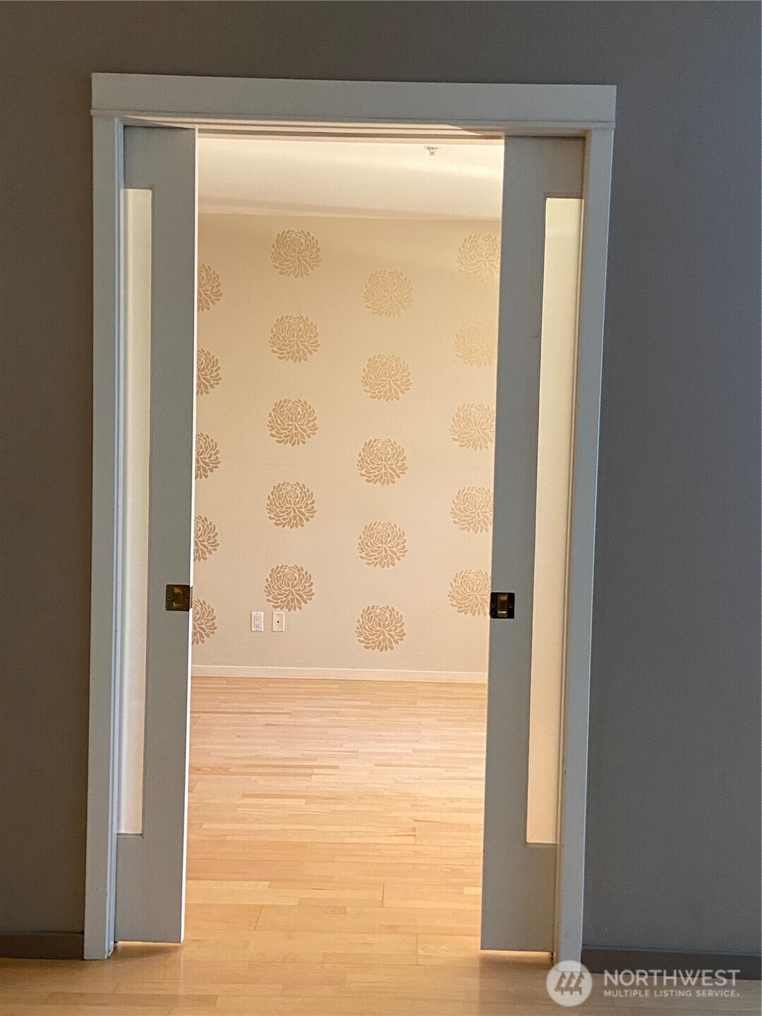 1900 Alaskan Way, Unit 402 Seattle, WA 98101 - Photo 15 of 32 a bathroom with a glass door