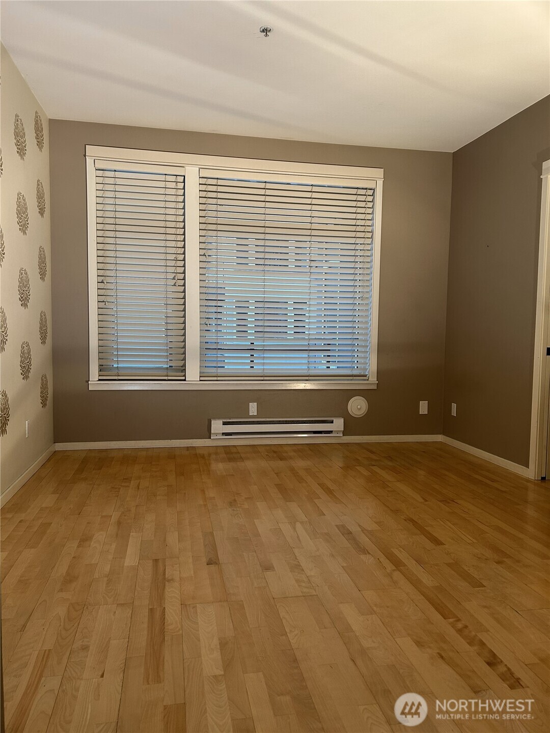 1900 Alaskan Way, Unit 402 Seattle, WA 98101 - Photo 16 of 32 a view of an empty room with a window