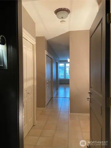 a bathroom with a glass door shower