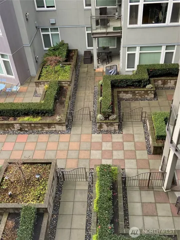a view of swimming pool with seating space