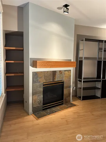 a view of livingroom with hardwood floor and a ceiling fan
