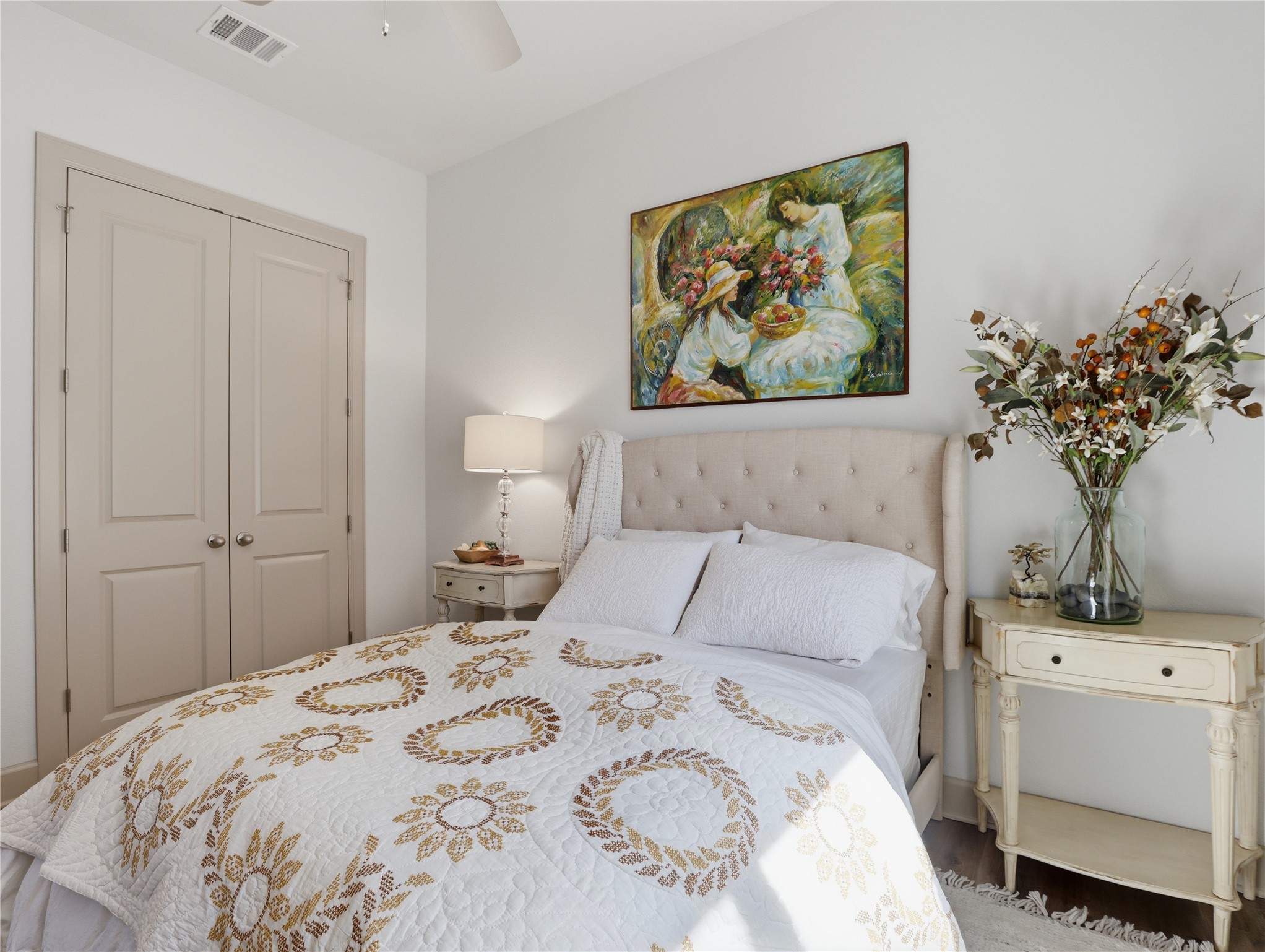 112 Mountain Lion Road Georgetown, TX 78628 - Photo 23 of 37 a bedroom with a bed and a painting on the wall