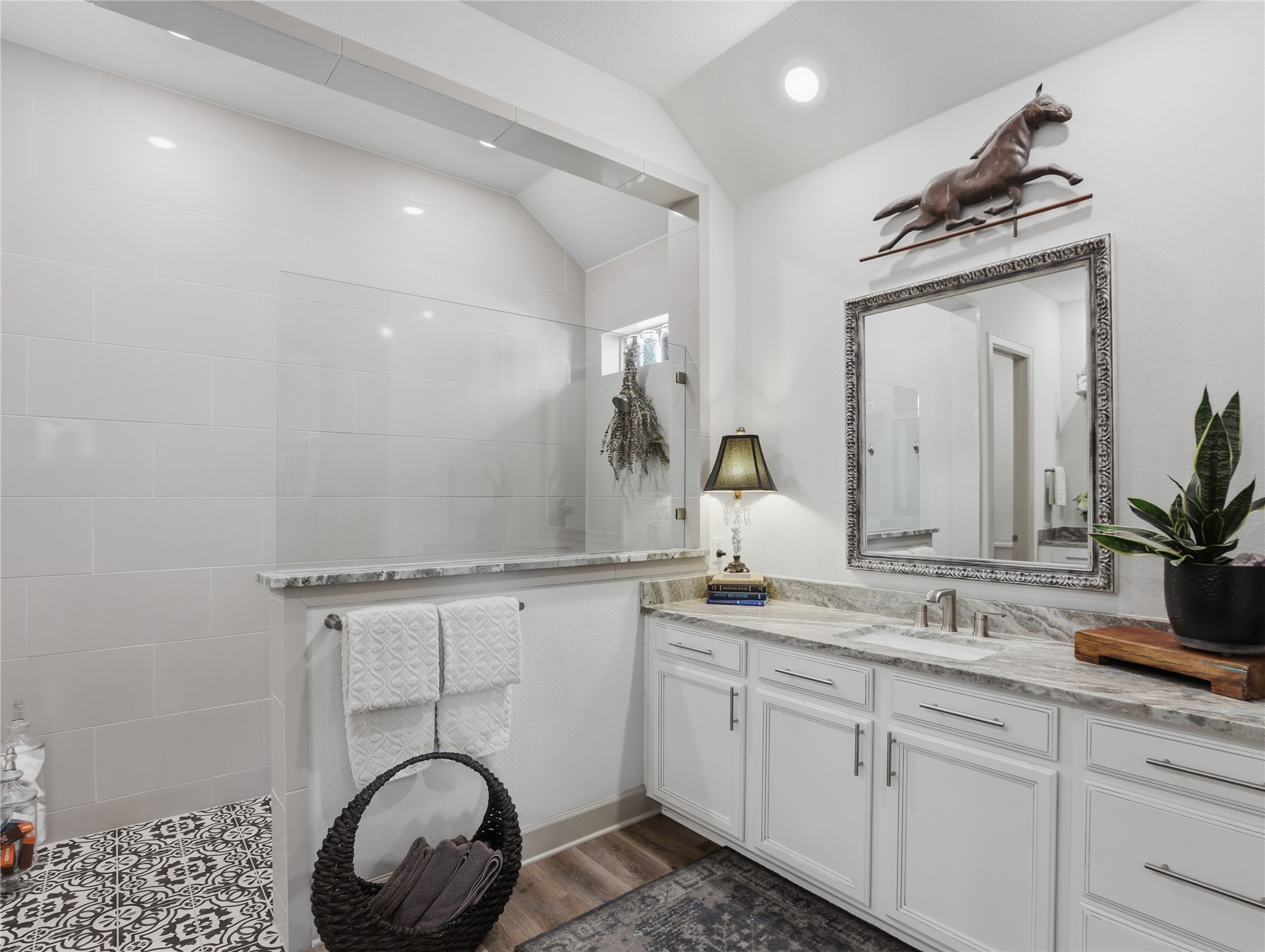 112 Mountain Lion Road Georgetown, TX 78628 - Photo 28 of 37 a bathroom with a sink and a mirror