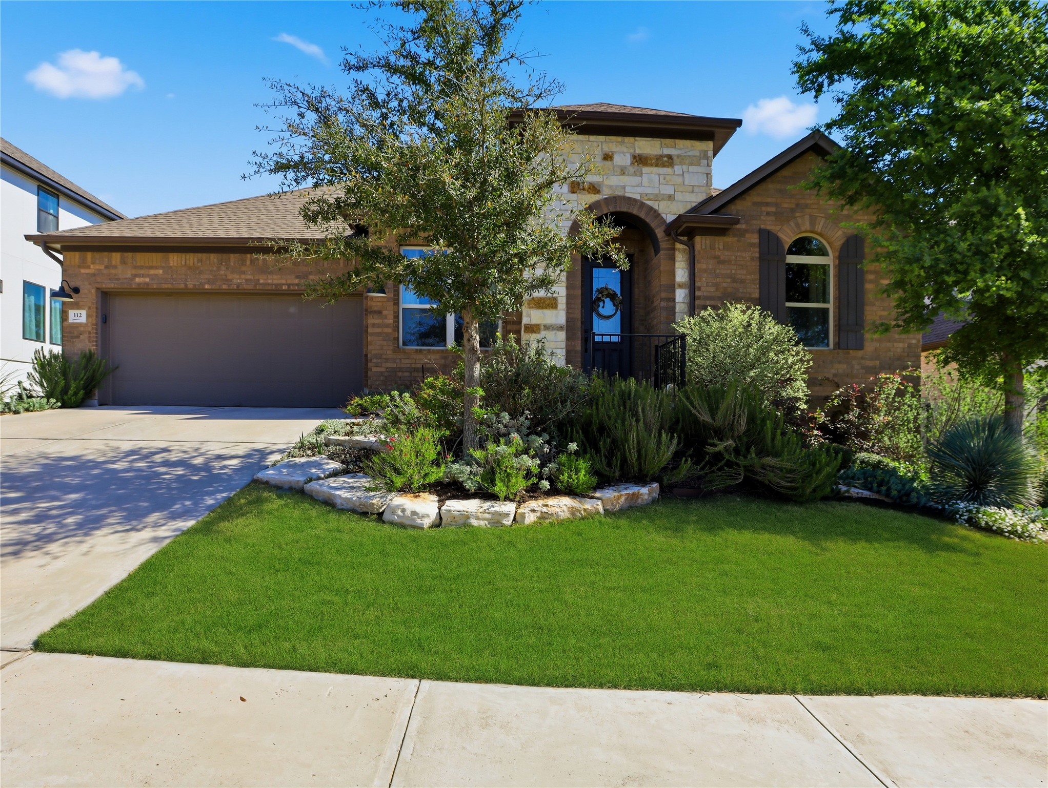 112 Mountain Lion Road Georgetown, TX 78628 - Photo 3 of 37 a front view of house with yard