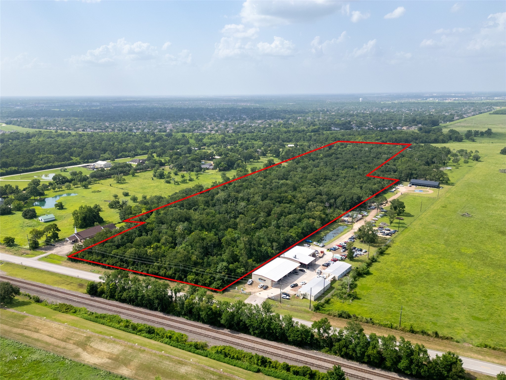 8915 FM 2759 Road Richmond, TX 77469 - Photo 2 of 10 a view of a city with an ocean