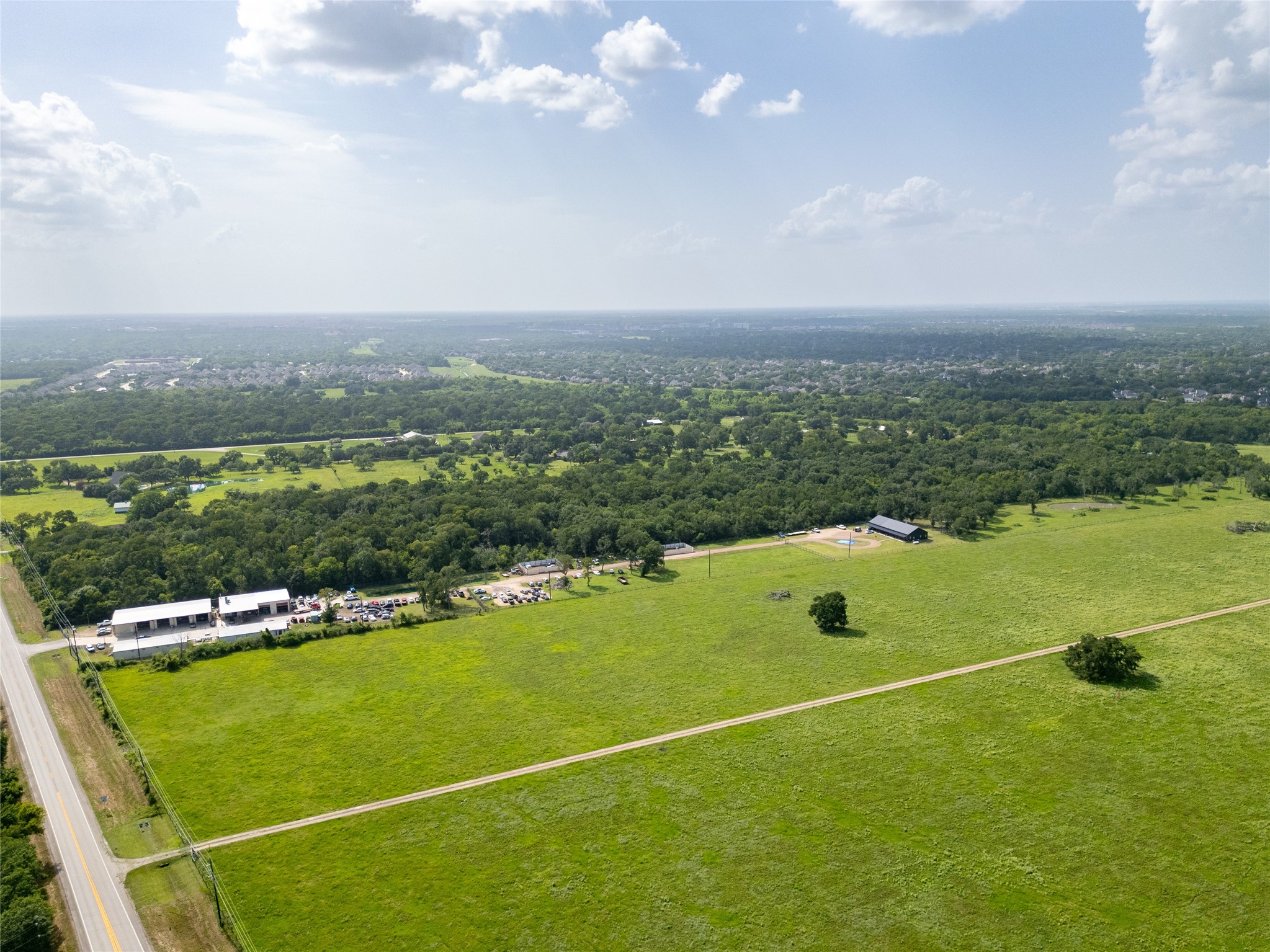 8915 FM 2759 Road Richmond, TX 77469 - Photo 9 of 10 a view of a golf course with a lake view